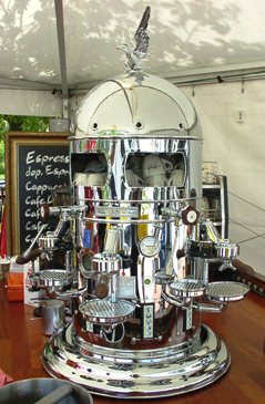 Pictured is a magnificent vintage chrome "traveling" (!) coffee machine.
